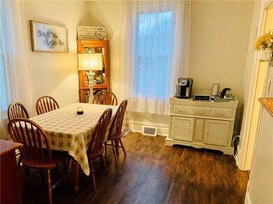 The dining room is off of the living room and also