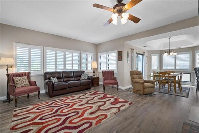 open floor plan with custom interior shutters