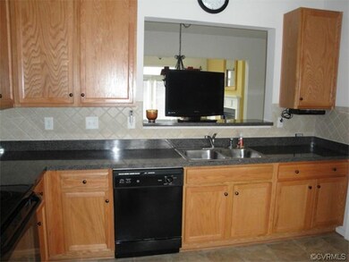 Another View of kitchen showing the opening to the