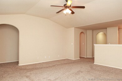 Open floor plan with newer carpet throughout