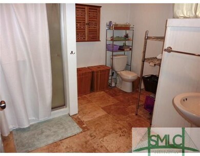 Other. Bathroom with Travertine Floors and Bead Bo