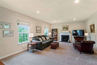 Bright and open family room with gas fireplace!