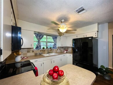 Kitchen- the refrigerator stays!