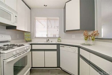 Spacious open kitchen with window over sink to loo