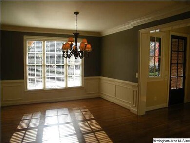 Formal Dining Room with Hardwoods, Crown Molding a
