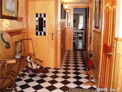 Foyer. Charming back entry hall.