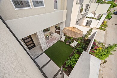 This photo showcases a modern courtyard with artif