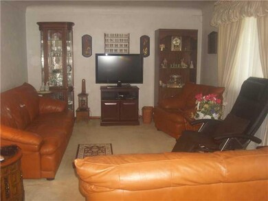 Living Room. Plastered walls are throughout main f