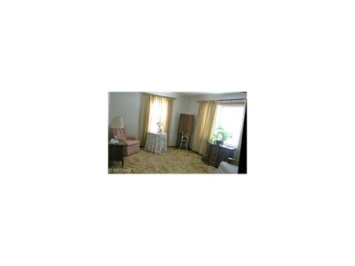 The Living Room has large windows to let the sunsh