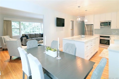 Eat-in Kitchen with Sliders to intimate , private deck.