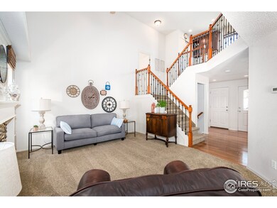 Living room and stairway to upper levels.