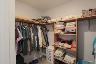 Walk-In Closet in primary bathroom