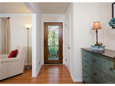 The foyer welcomes you home with a new exterior do