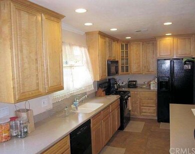 Remodeled kitchen with corian counters
