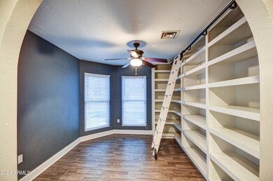 Library/Den