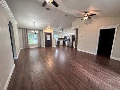 LR looking toward kitchen and dining area