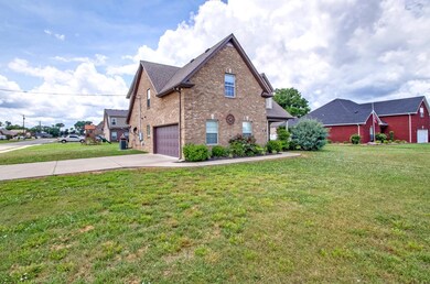 The size of the corner home site provides space for a longer driveway.  Great for your extra cars or your friends to park when they come to visit.