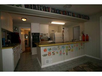 Kitchen. The kitchen has lots of storage, a separa