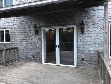 Two tiered deck with sliding glass...