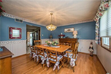 The home's dining room has a wide opening into the