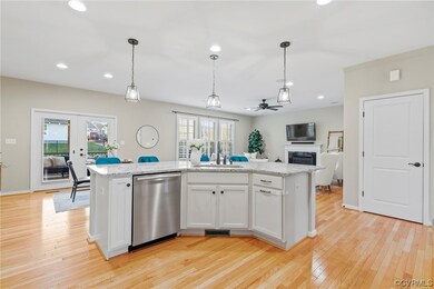 Kitchen featuring island, pendant lights and reces