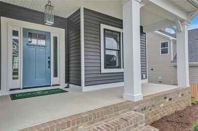 Masonry Front Porch and black exterior windows is 