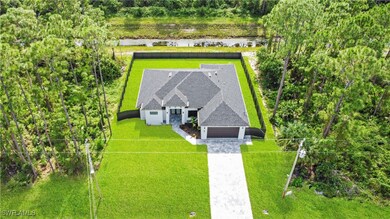 1108 Bari St E, Lehigh Acres, FL 33974 - photo 3