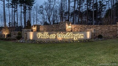 Falls Entrance to Amenities and Clubhouse at night