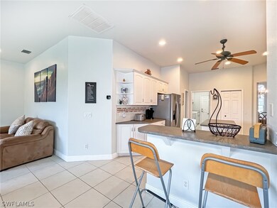 kitchen opens to the family room