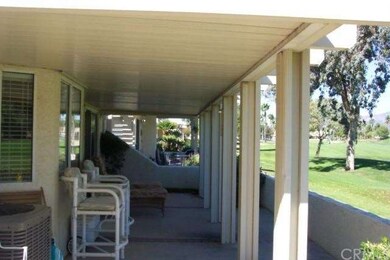 Relax on the east facing patio with aluma-wood cov