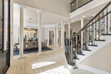 Enter the foyer to find the formal dining room to your left and a convenient home office to your right.