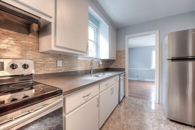 RENOVATED Kitchen ....... NEW Stainless Steel Appliances, NEW Countertops,  & NEW Ceramic Tile Floor