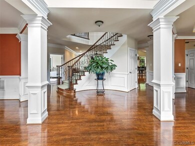 Circular staircase to the 2nd level, opens to all