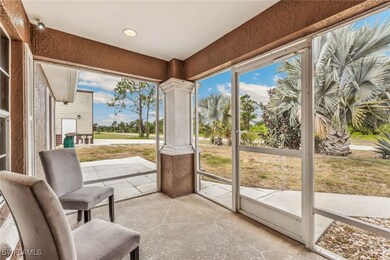 Front Screened Entry. Concrete Patio adjacent to i