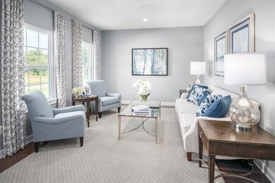 The front flex area can be used as formal dining room or a stunning sitting area like this!