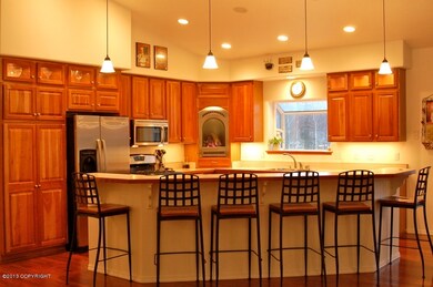 Lighted Glass Cabinets and a fireplace!