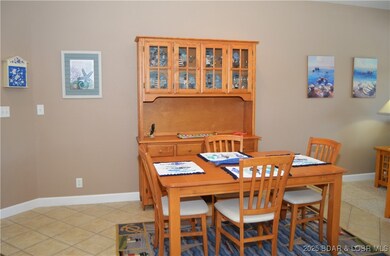 Dining area with table and hutch
