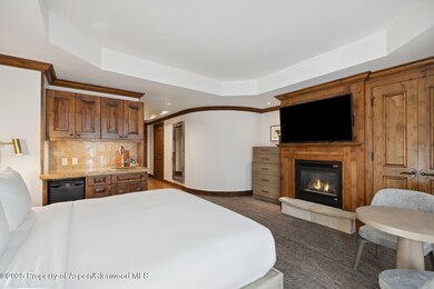 44ABedroomBedFireplaceKitchenette
