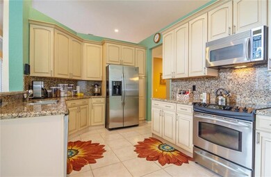Backsplashes are also granite.  This impeccable ho