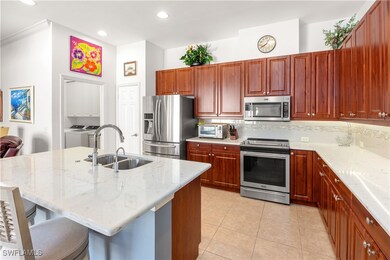 Kitchen featuring appliances with stainless steel