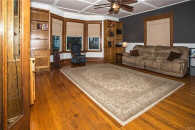 LARGE BAY WINDOWS IN LIVING ROOM