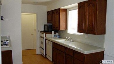 The galley style kitchen offers convenience for th