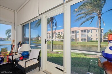 Sunroom featuring a water view and a wealth of nat