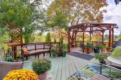 Beautiful outdoor living with views of open space and mountains