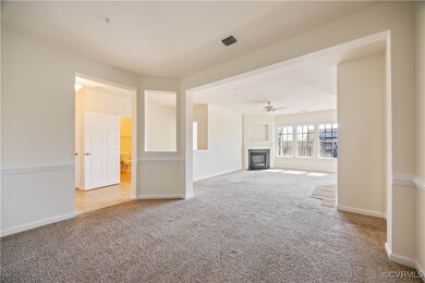 View of Great Room with gas logs fireplace and cei
