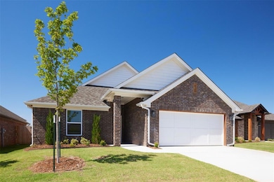 View of front of property with a garage and a fron