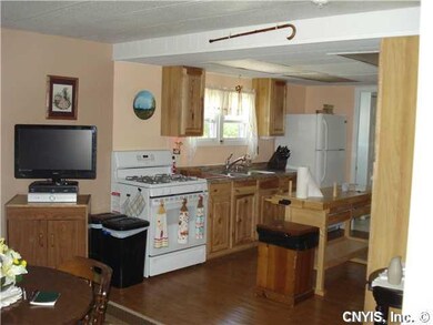 Kitchen. Large kitchen offers plenty of room for m