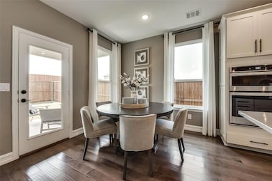 Dining nook off kitchen *Photos of furnished model. Not actual home. Representative of floorplan. Some options and features may vary.