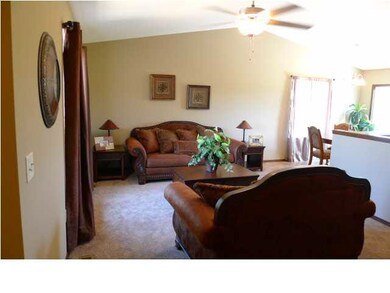 SPACIOUS LIVING ROOM WITH VAULTED CEILING