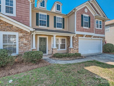 Imagine spending quiet evenings relaxing on the covered front porch.